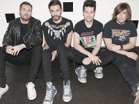 Bastille  Bastille band members wearing various high top blue and white low cut pairs of chucks.